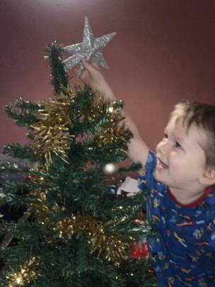 134. My little grandson Declan is so excited to put the star on his tree