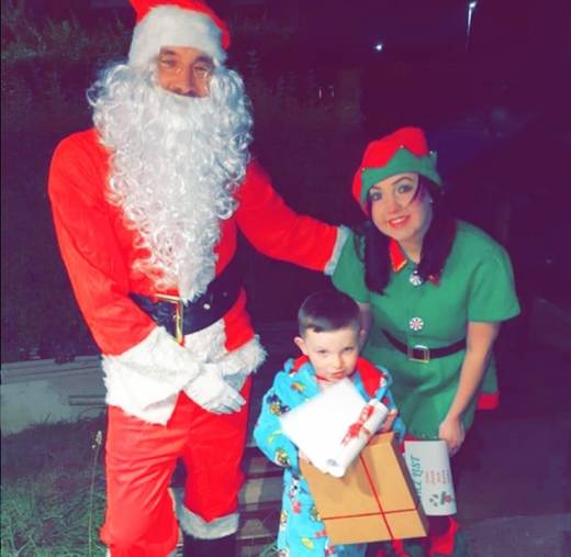 Main image for Youngsters on the good list getting rewarded by Santa
